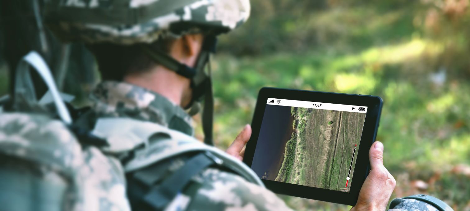 Soldier using tablet to navigate