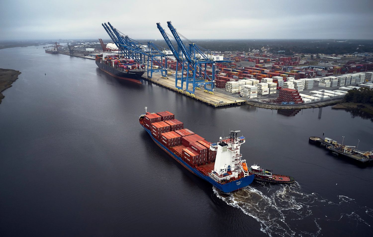 aerial view of cargo ship entering port of wilmington