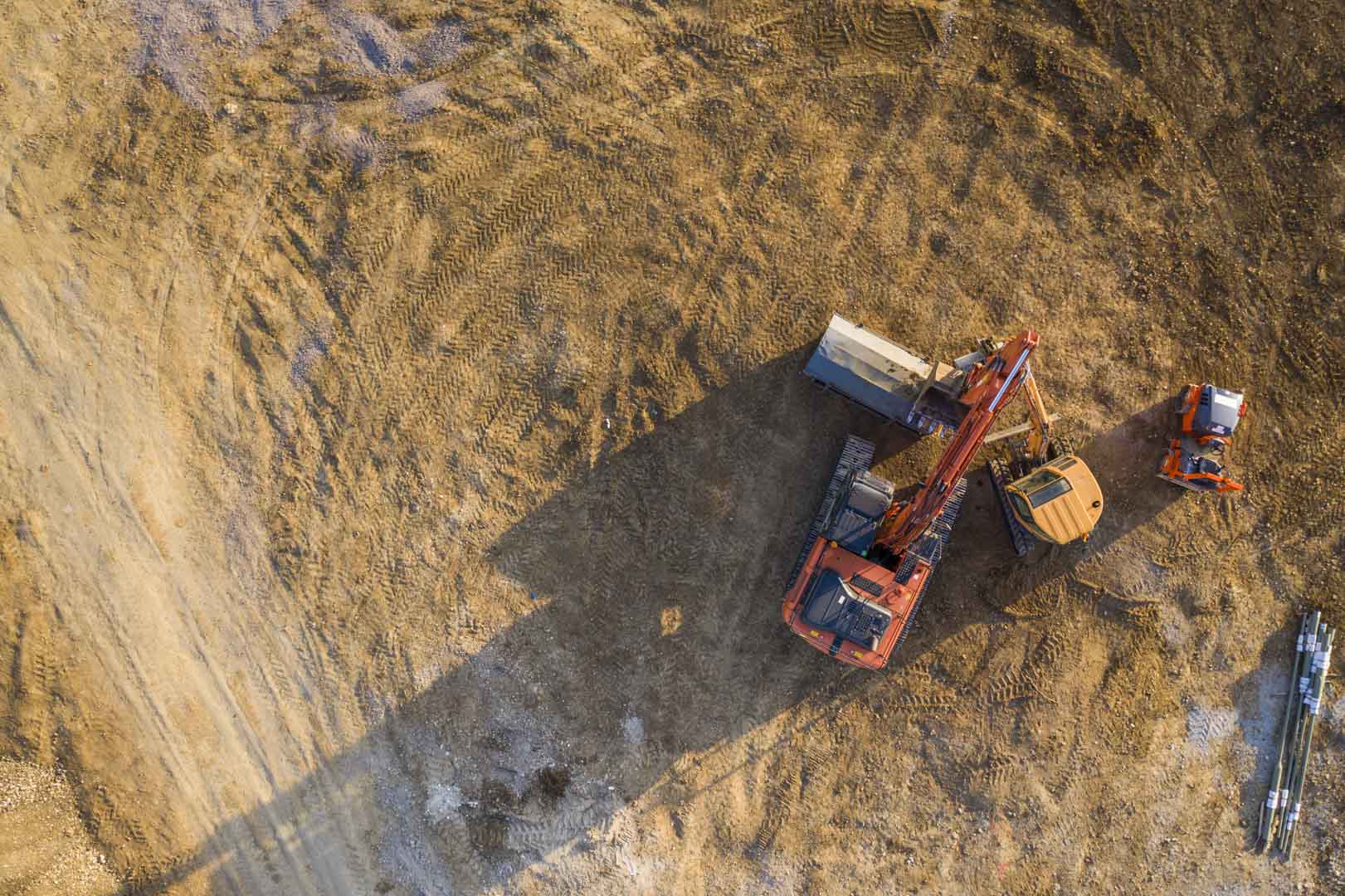 aerial view of heavy machinery on construction site