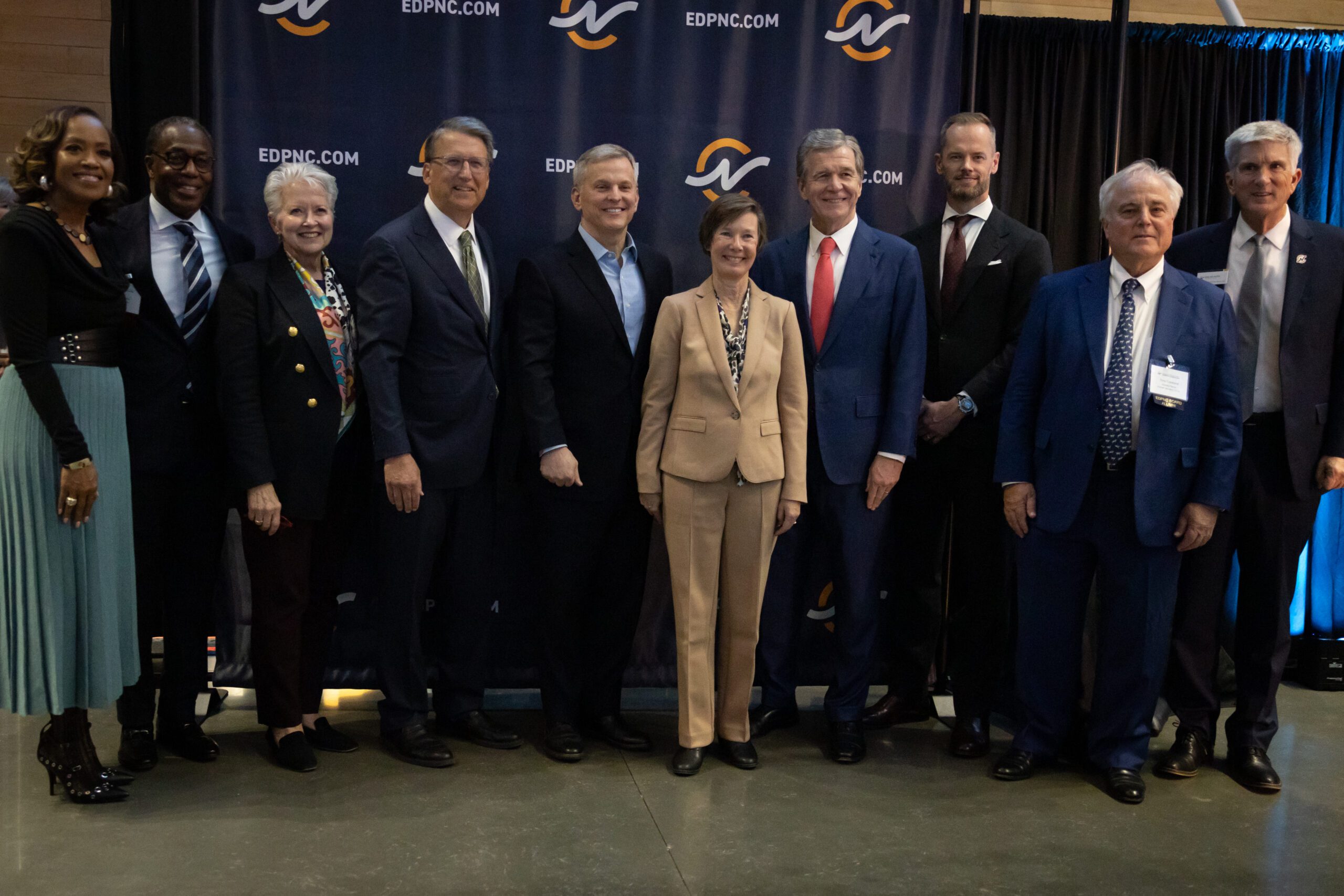 Former Governor's of NC posing for photo at EDPNC 10 Y Anniversary event