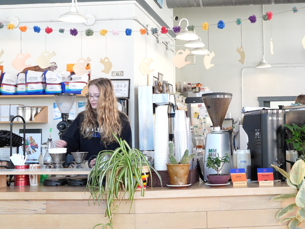 Barista working at Larema Coffee House