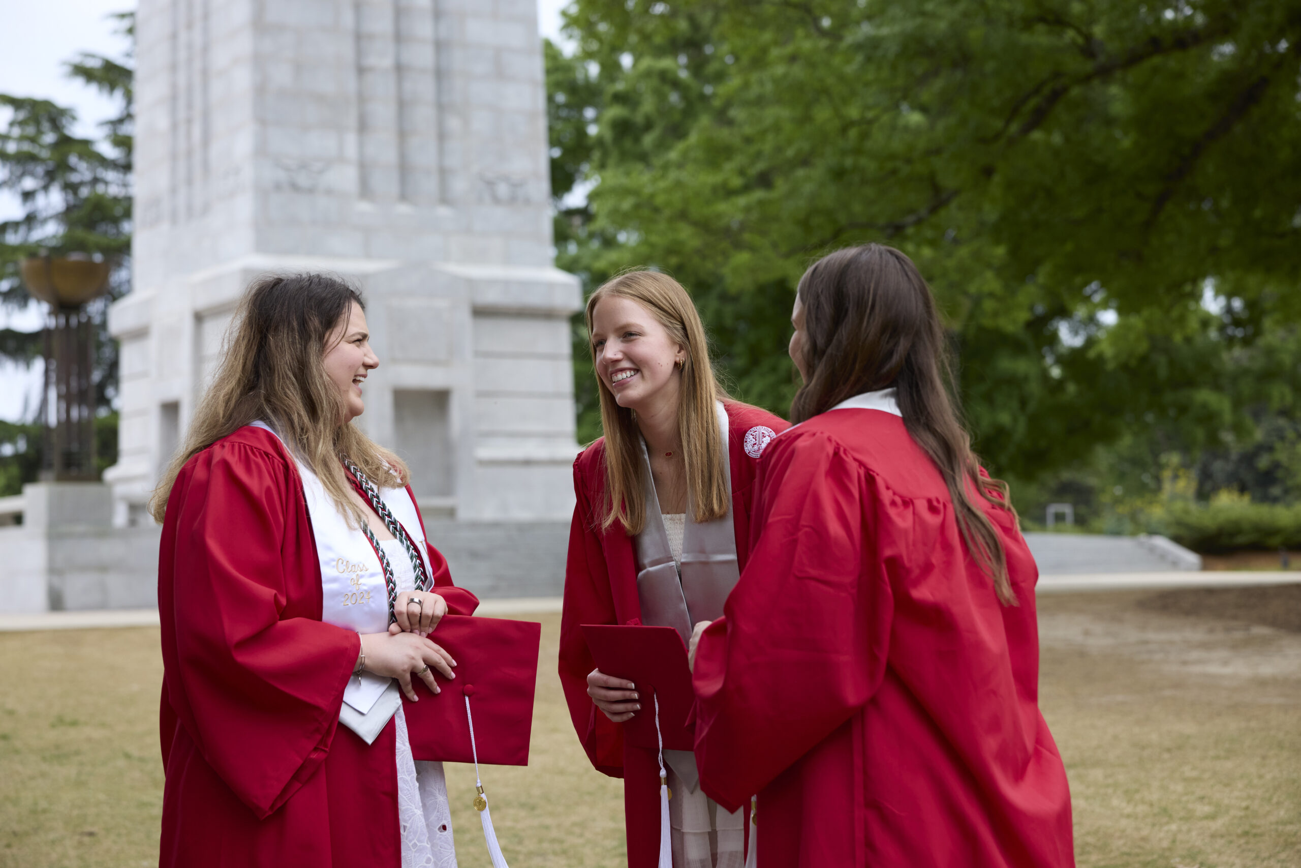 a group of NC State students in their cap and gown