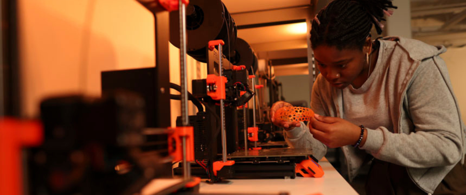 student in 3D printing lab